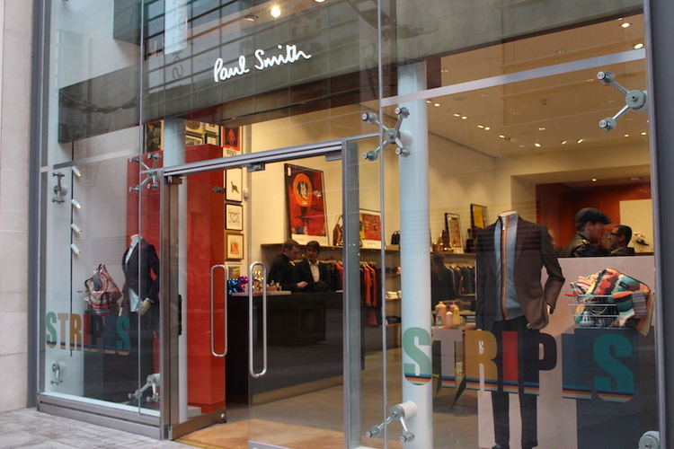 Paul Smith storefront, mannequins wear the latest business attire line