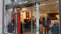 Paul Smith storefront, mannequins wear the latest business attire line